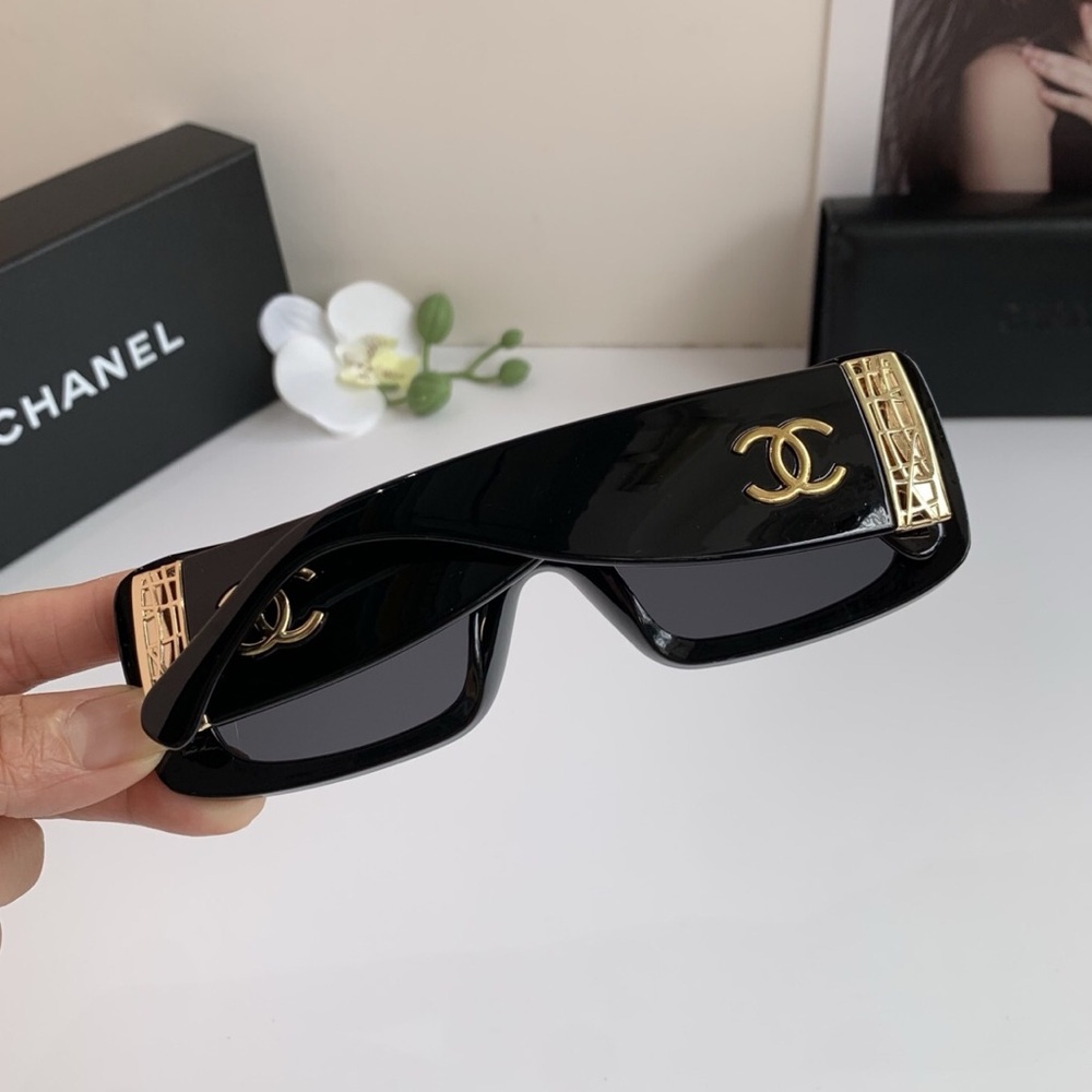 CHANEL Black and Gold Rectangular Sunglasses